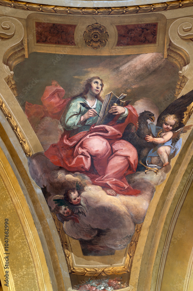 Naklejka premium ASTI, ITALY - SEPTEMBER 11, 2024: The fresco of St. John the Evangelist in the church Chiesa di San Paolo by Carlo Gorzio (1762 - 1794)