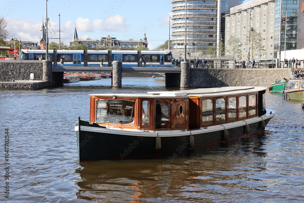Salon boat in front of Amsterdam Central Station