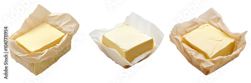 A block of unsalted butter partially wrapped in parchment paper, with smooth, creamy texture visible, isolated on a transparent background photo