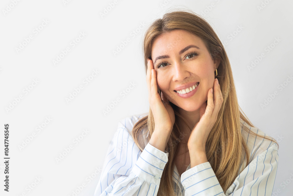 Portrait of a young Caucasian woman with pleasant smile isolated on yellow wall with copy space. Portrait of a young Caucasian woman with pleasant smile isolated on yellow wall with copy space.