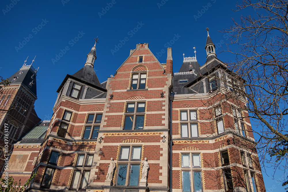 Fototapeta premium Neorenaissance former official residence for chief director of Rijksmuseum (1883). Rijksmuseum holds many masterpiece paintings of Dutch and world art. Amsterdam, the Netherlands.