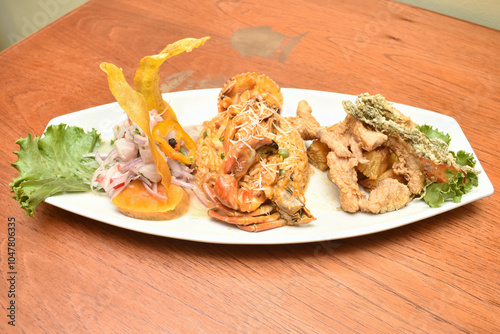 Fish ceviche and rice with seafood, traditional Peruvian dish of fish and seafood