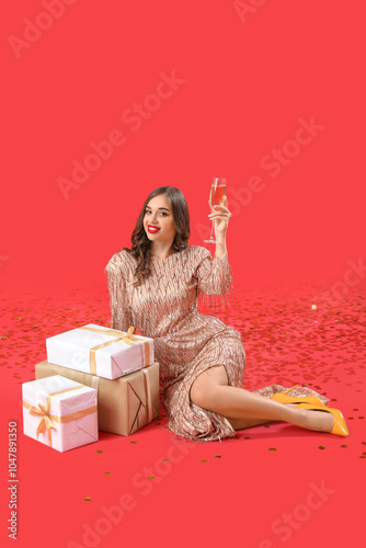 Young woman with champagne ...