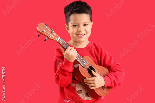 Cute little Asian boy playi...
