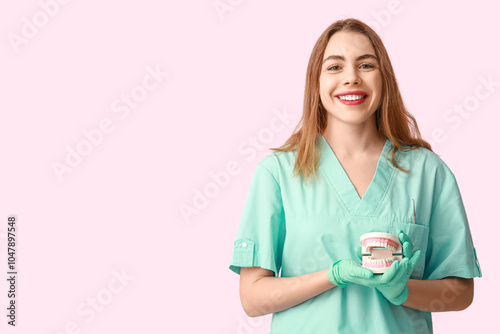 Female dentist with jaw mod...
