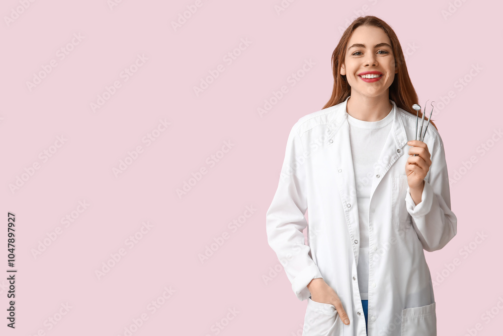 Female dentist with dental tools on pink background. World Dentist Day Female dentist with dental tools on pink background. World Dentist Day
