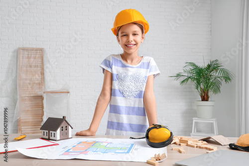 Little architect at table i...