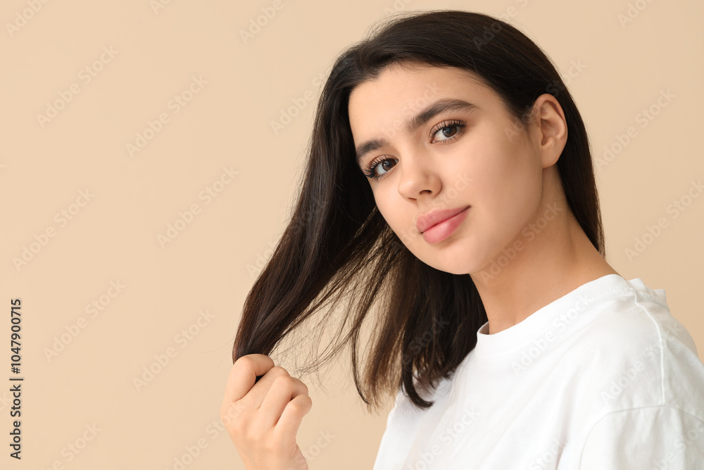 Young woman with dandruff problem examining her hair on beige background Young woman with dandruff problem examining her hair on beige background