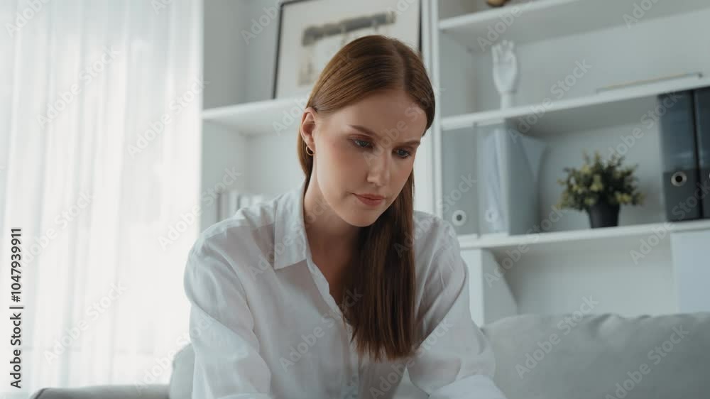 Stressed young woman has financial problems with credit card debt to pay prim from bad personal money and mortgage pay management crisis. Woman worry about financial bankruptcy risk from over spending Stressed young woman has financial problems with credit card debt to pay prim from bad personal money and mortgage pay management crisis. Woman worry about financial bankruptcy risk from over spending