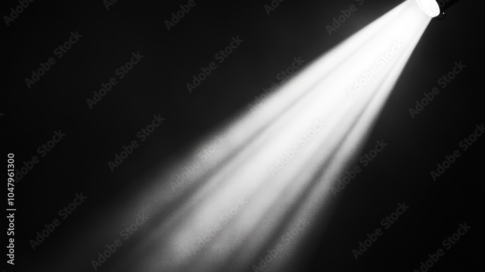 Focused Spotlight Beam in Dark Background Focused Spotlight Beam in Dark Background