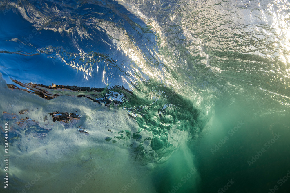 Fototapeta premium A close-up shot capturing the dynamic movement and texture of a wave in Sydney, Australia.