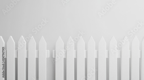 Clean White Picket Fence Against Light Background