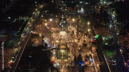 An aerial view of Lingaraj temple  at night, bustling with devotees during Shivratri festival, adorned with countless lights and a vibrant atmosphere. Bhubaneshwar, Odisha photo