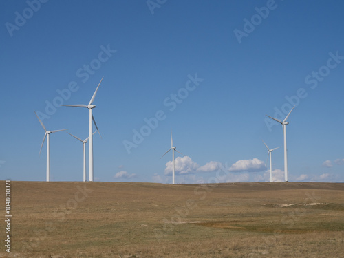 Wallpaper Mural Group of Wind Turbines in a Prairie with Blue Sky and Scattered Cumulus Clouds Torontodigital.ca