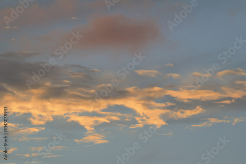 Orange And Yellow Colors Sunset Sky. Sunlight through clouds