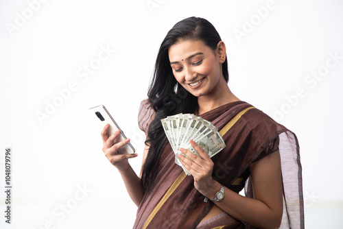 Wife Posing With 500 Rupees Notes And Mobile Phone In Her Hands
