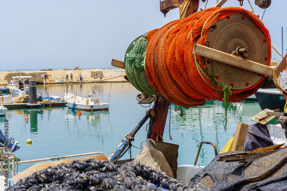 Fishing net and boats, historic port of Jaffa