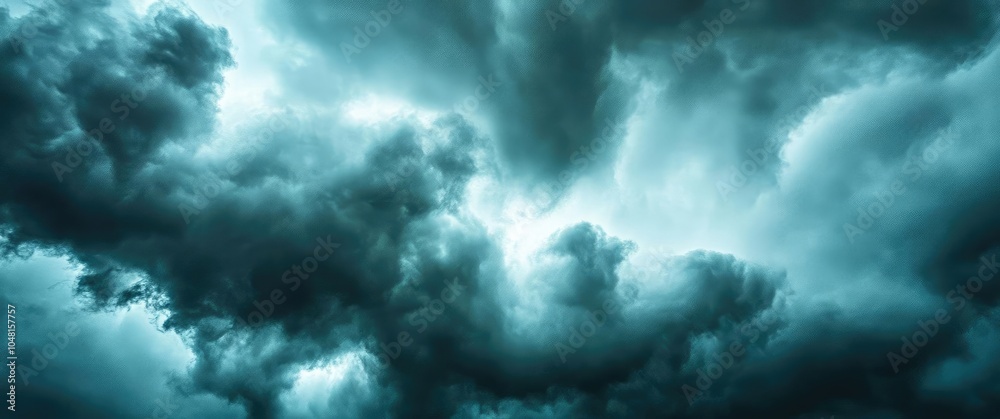 Obraz premium Dramatic Dark Storm Clouds Gather in the Sky