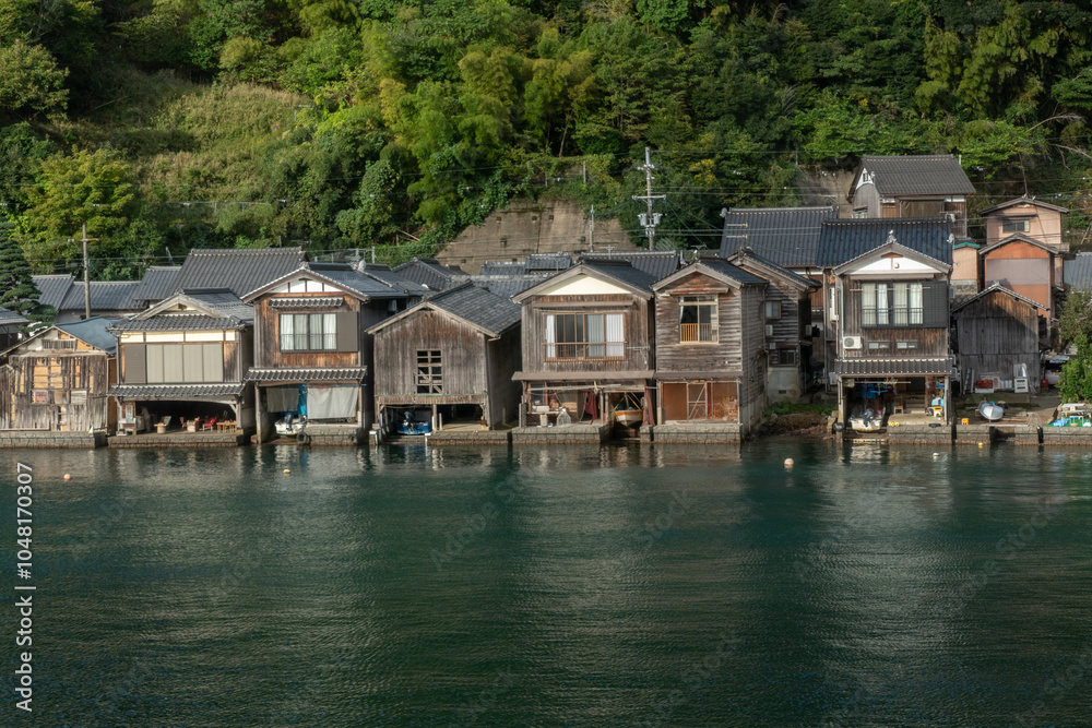 Funaya Boathouses in Ine fisherman village Kyoto Prefecture, The funayas were originally constructed to lift fishermen's wooden boats from the sea