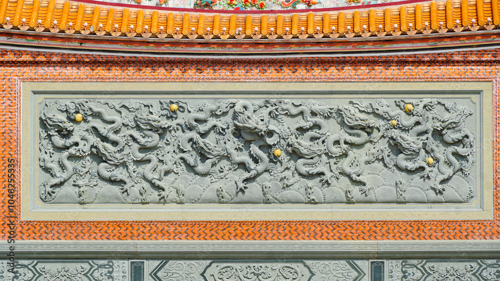 Stone carved dragons on the walls, Huiju Temple Minnan-Taiwanese Style Classical Architecture, Suzhou, Jiangsu, China Stone carved dragons on the walls, Huiju Temple Minnan-Taiwanese Style Classical Architecture, Suzhou, Jiangsu, China