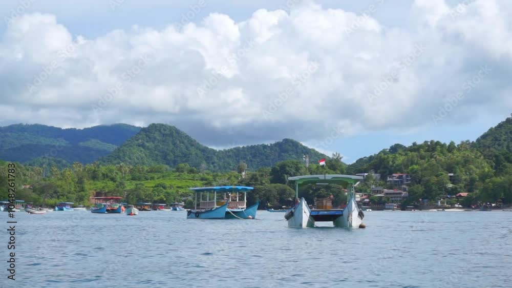 Tour boat for tourist and divers at Sabang and Rubiah island. Beautiful landscape of Sabang island in Sumatera, Indonesia Tour boat for tourist and divers at Sabang and Rubiah island. Beautiful landscape of Sabang island in Sumatera, Indonesia