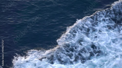 Ocean sea water splashing from the boat. Seascape from high perspective