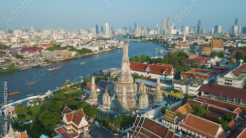 Aerial view sunset wat arun situated on the west bank of the Chao Phraya River. sightseeing travel Bangkok Thailand