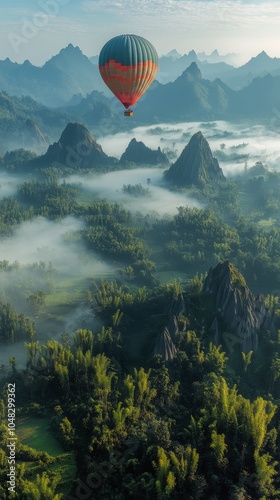 Hot air balloon soaring over volcanic landscape at dawn with clouds enveloping the earth photo