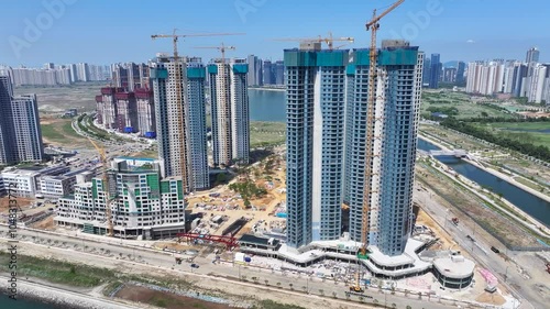 Aerial view of high-rise apartment construction site around Songdo Waterfront, Incheon, South Korea photo