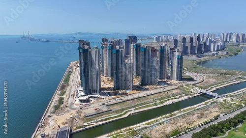 Aerial view of high-rise apartment construction site around Songdo Waterfront, Incheon, South Korea photo