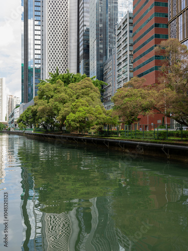 Reflections in the Staunton Creek in Wong Chuk Hang District in Southern Hong Kong photo