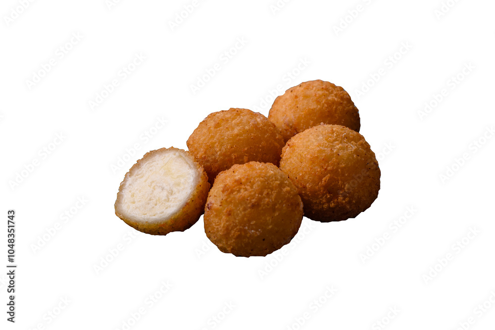 French fries balls with breaded brie or camembert cheese with sweet berry sauce French fries balls with breaded brie or camembert cheese with sweet berry sauce
