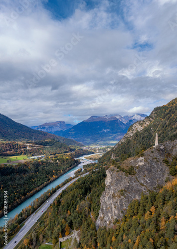 view of the Rhine River in the Domleschg Valley and the Hochjuvalt fortress