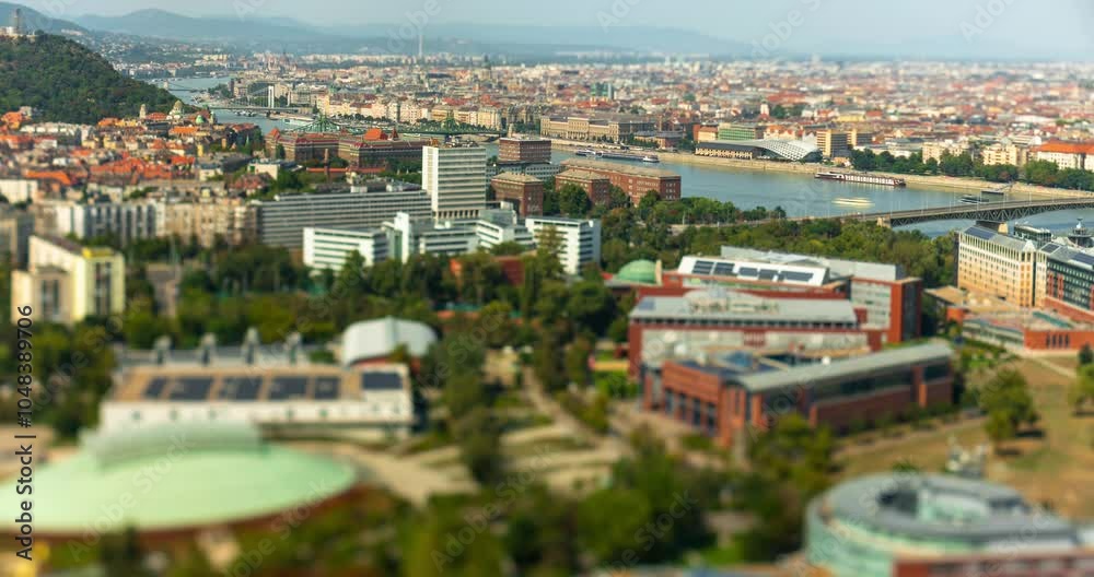 Budapest, Hungary - August 24, 2024: Panoramic View Over Budapest's Landmarks and Danube River. Timelapse, slide transition. Focus shifted to the river with tilt shifted lens.