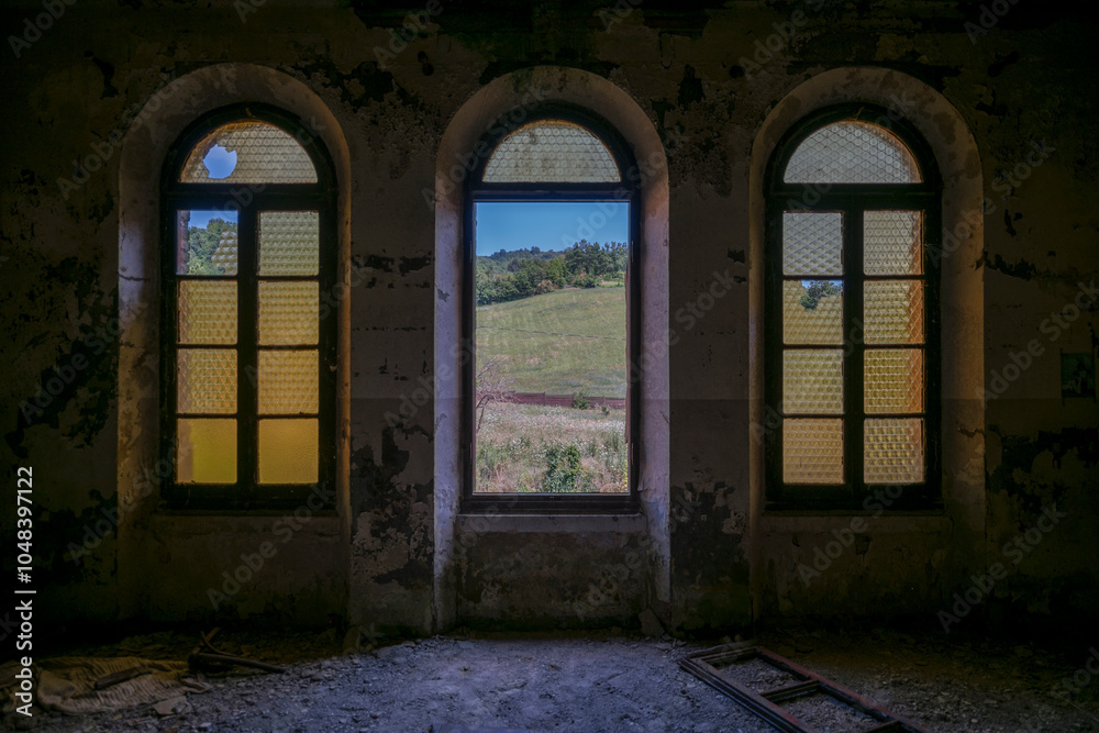 Fototapeta premium Forgotten Building in Northern Italy The Old Abandoned Seminary with a Blue Chapel