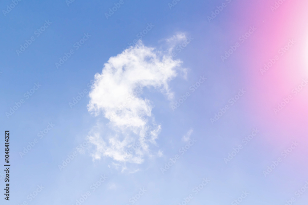 White airy beautiful clouds in a bright blue sky. Clear sunny weather. The concept of environmental safety and cleanliness.. White airy beautiful clouds in a bright blue sky. Clear sunny weather. The concept of environmental safety and cleanliness..