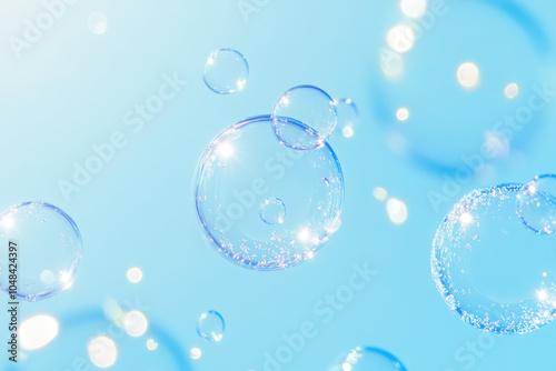 Bubbles float gracefully in serene blue background, capturing light and creating magical atmosphere. Their delicate nature evokes sense of joy and wonder