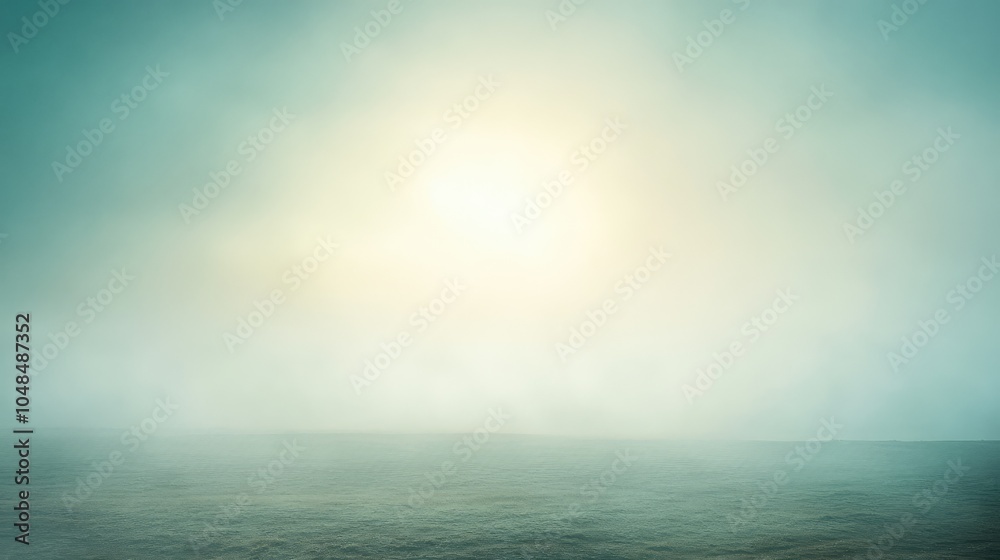 Obraz premium A dense hazy sky with light fog obscuring the horizon, creating an ethereal, otherworldly landscape bathed in diffused sunlight
