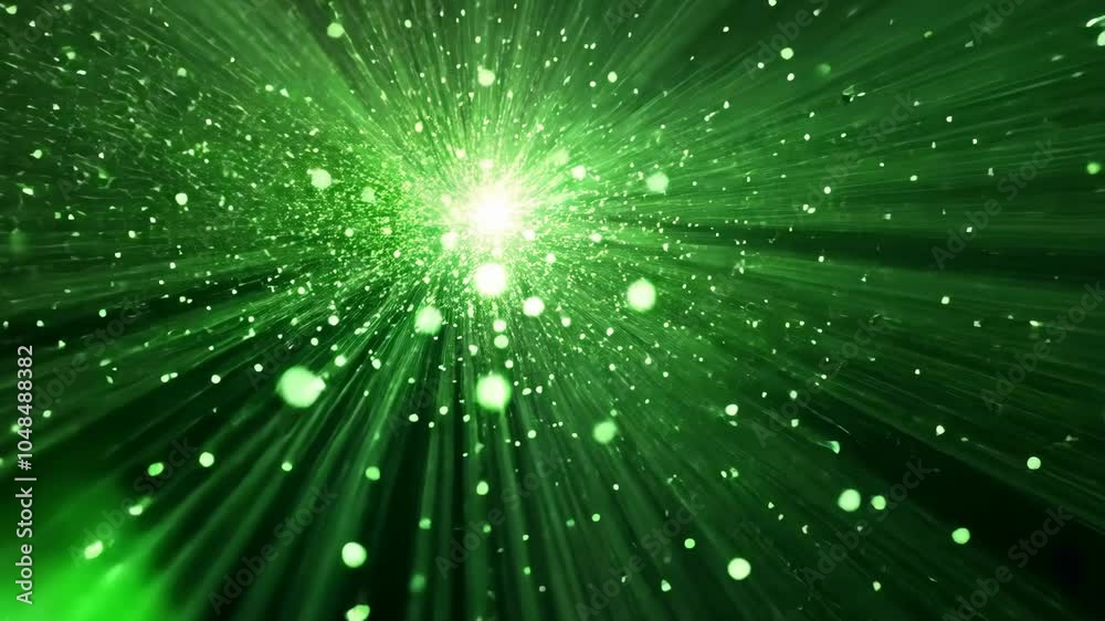 A bright light shines through green rays and sparkles in a dark background
