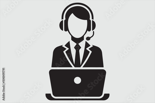 Silhouette of a person sitting behind a laptop.