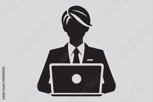 Silhouette of a person sitting behind a laptop.