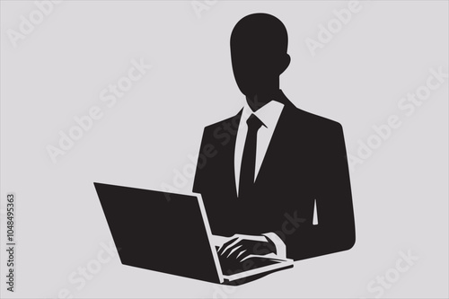 Silhouette of a person sitting behind a laptop.