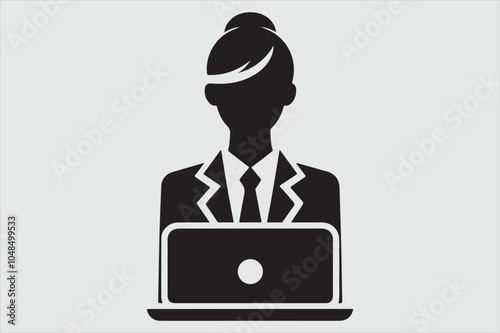 Silhouette of a person sitting behind a laptop.