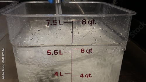 Pour water into the glass. Filling water to 7.5 litre  water tank.