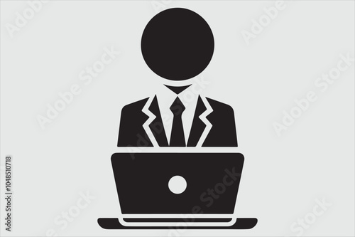 Silhouette of a person sitting behind a laptop.