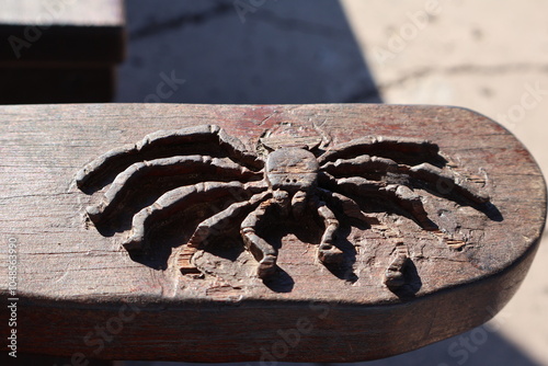 Spider Engraved on Wood photo