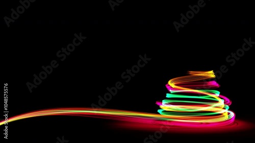 Christmas tree from yellow, green and red neon streaks. 3D Animation. 4k. 