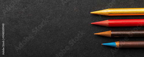 Closeup of calligraphy tools, black studio background, art and precision