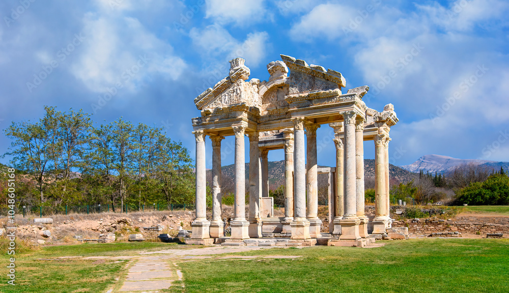 Fototapeta premium Aphrodisias Ancient city (Afrodisias) in Turkey. The ruins of The Tetrapylon, Monumental Gate. The city was named after Aphrodite, the Greek goddess of love