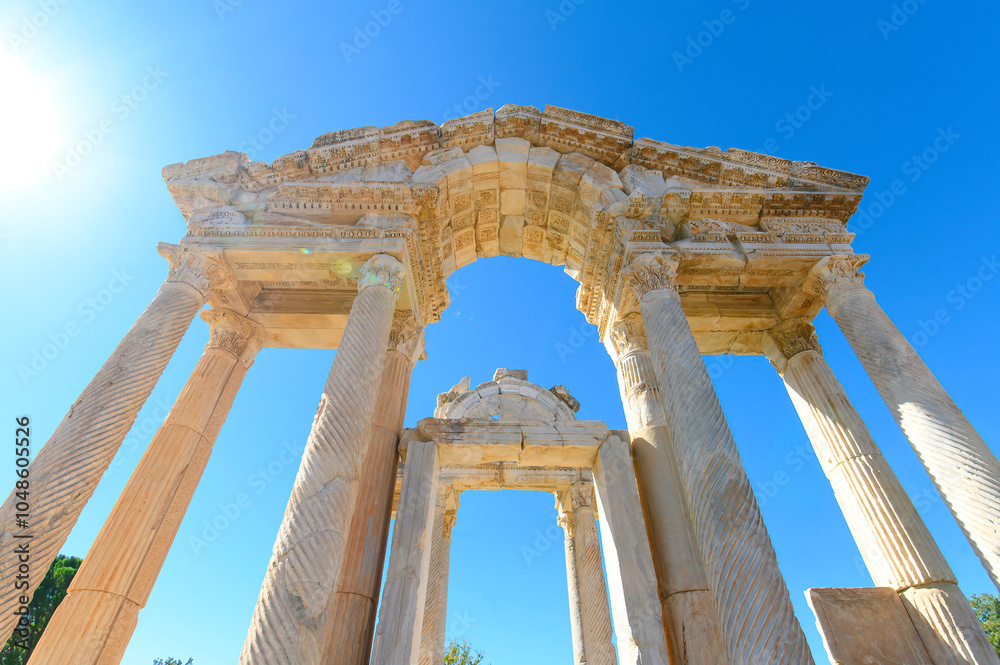 Fototapeta premium Aphrodisias Ancient city (Afrodisias) in Turkey. The ruins of The Tetrapylon, Monumental Gate. The city was named after Aphrodite, the Greek goddess of love